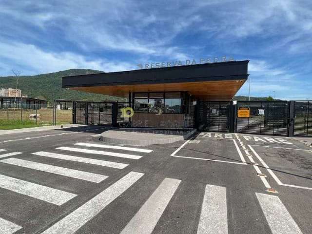 Terreno em condomínio fechado à venda, 300 m² por R$ 1.200.000 - Pedra Branca - Palhoça/SC