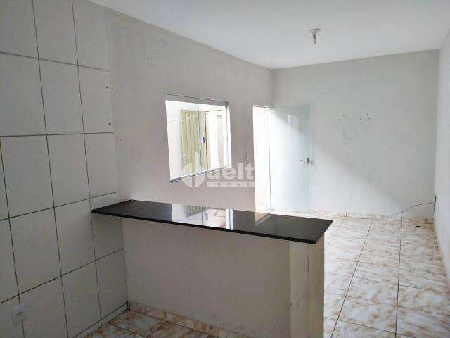 Casa residencial disponível para venda no bairro Jardim Canaã em Uberlândia-MG