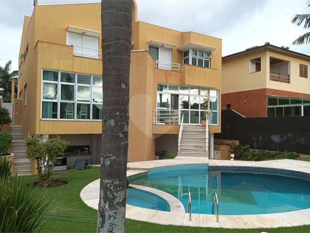 Casa em condomínio fechado com 4 quartos para alugar na Rua Ipê, 166, Tamboré, Santana de Parnaíba, 461 m2 por R$ 20.000