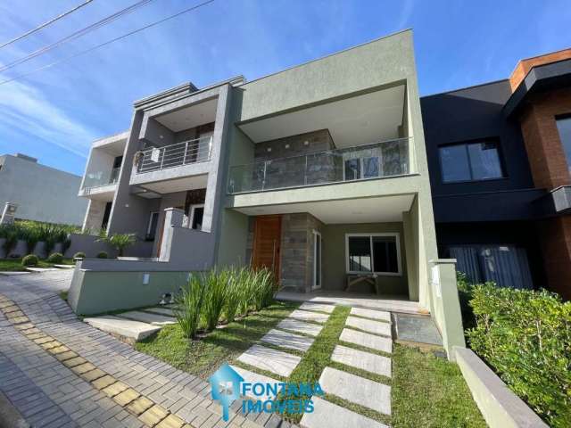 Casa com 3 dormitórios à venda, 153 m² por R$ 930.000,00 - Primavera - Gravataí/RS