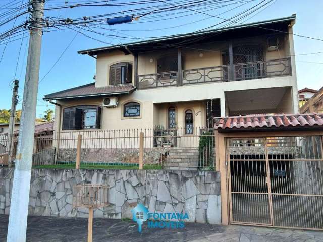 Casa com 4 dormitórios à venda, 240 m² por R$ 850.000,00 - Jansen - Gravataí/RS