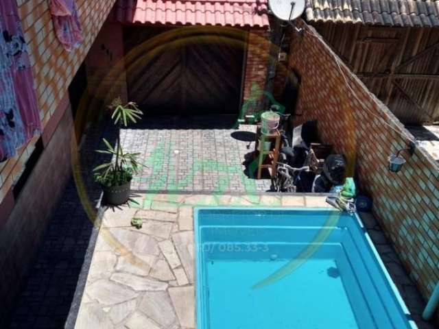 Casa com 5 quartos e piscina em unamar.