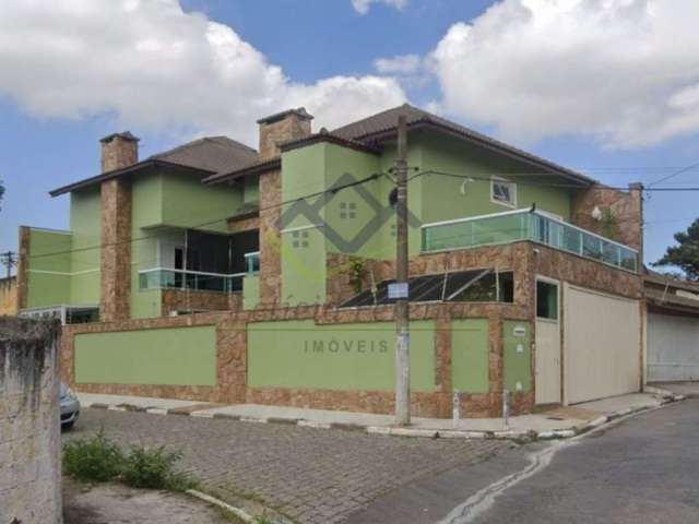 Sobrado com 3 dormitórios à venda, 308 m² por R$ 1.200.000,00 - Centro - Poá/SP