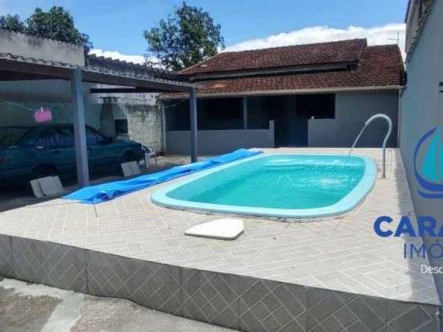 Casa com edícula e piscina a venda