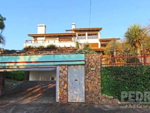 Casa com 4 quartos à venda no Teresópolis, Porto Alegre  por R$ 1.300.000