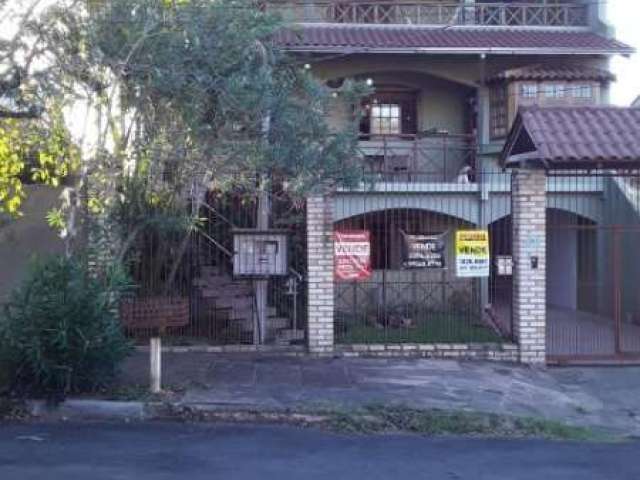 Casa com 6 quartos à venda no Campo Novo, Porto Alegre  por R$ 650.000