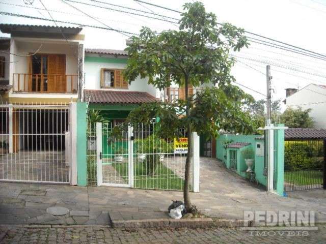 Casa com 3 quartos à venda no Nonoai, Porto Alegre  por R$ 850.000