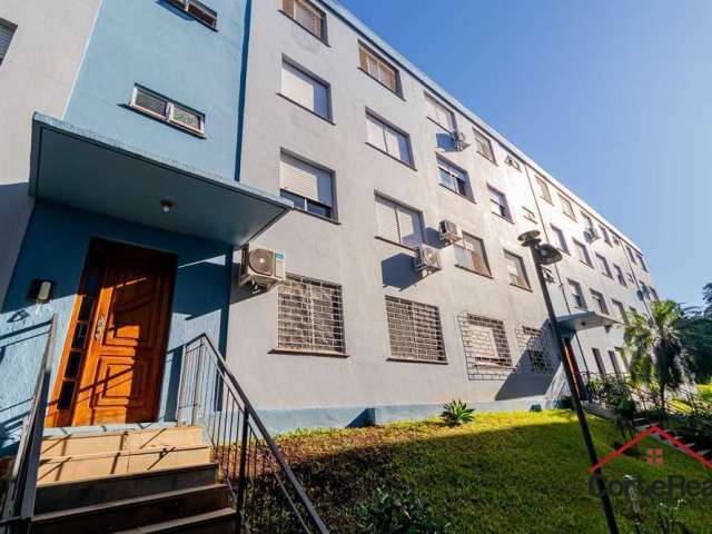 Apartamento com 3 quartos à venda na Rua Guilherme Schell, 570, Santo Antônio, Porto Alegre por R$ 220.000
