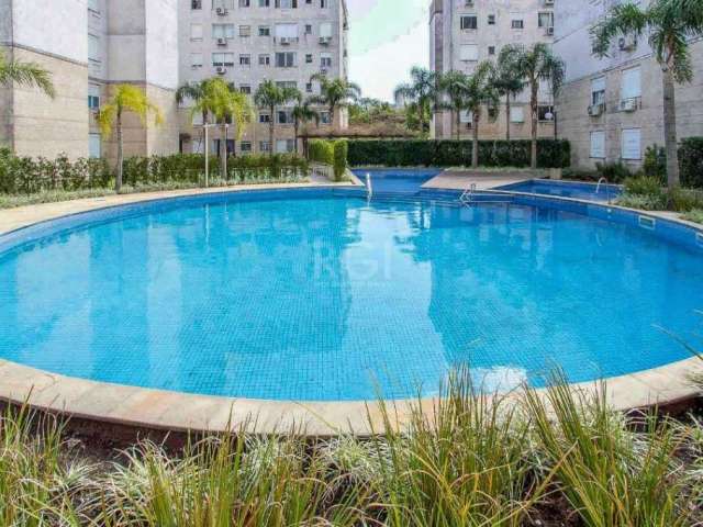 Excelente apartamento de 3 dormitórios, sendo 01 suíte. Semi-mobiliado, com living para dois ambientes, cozinha estilo americana, com lavanderia integrada, banheiro social e uma vaga de garagem escrit