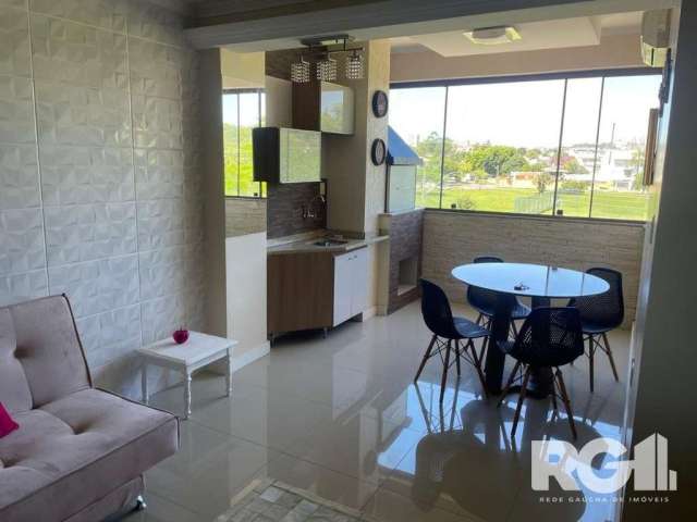 Apartamento com 2 dormitórios, suíte, churrasqueira, área de serviço separada, muito arejado, sol da manhã e da tarde. Piso porcelanato nas áreas de convívio e laminado nas áreas íntimas. Duas vagas d