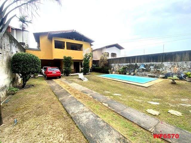 Casa no bairro Sapiranga, são 4 quartos,  8 vagas de garagem, piscina, nascente