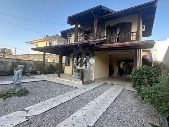 Casa com 4 quartos à venda na Rua Varese 33, 33, Pagani, Palhoça, 269 m2 por R$ 1.100.000