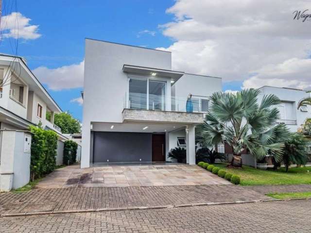 Casa em condomínio fechado com 3 quartos à venda na Avenida Santos Ferreira, 3125, Estância Velha, Canoas por R$ 2.350.000