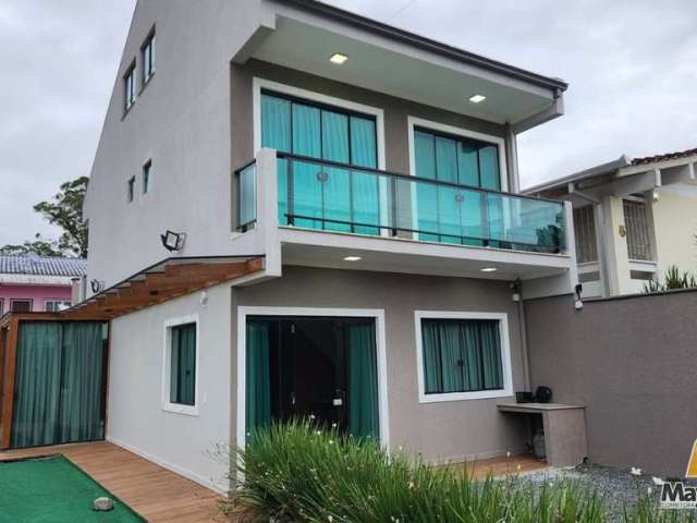 Casa com amplo terreno na praia do ubatuba.