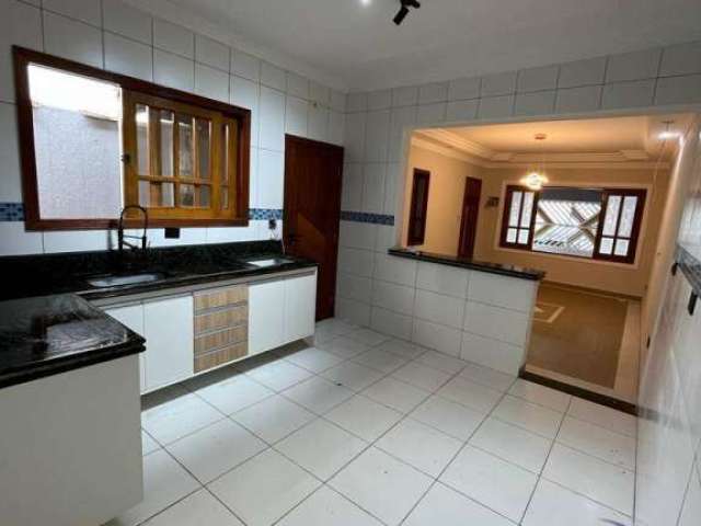 Casa com 3 dormitórios à venda, 123 m² por R$ 570.000,00 - Maracanã - Praia Grande/SP