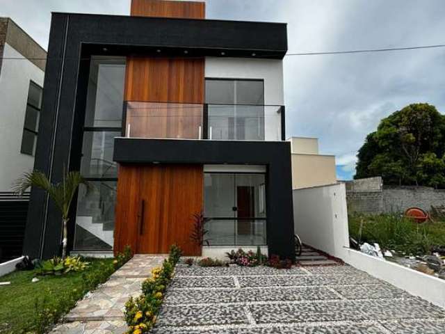 Casa em condomínio fechado com 3 quartos à venda no Abrantes, Camaçari  por R$ 890.000