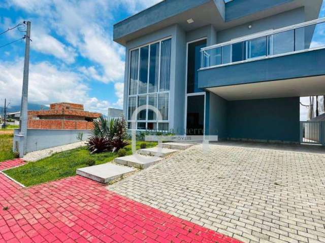 Casa com 4 dormitórios à venda, 212 m² por R$ 1.450.000,00 - Condomínio Flora Rica - Peruíbe/SP