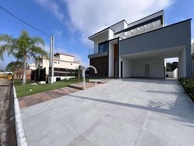 Casa com 4 dormitórios à venda, 272 m² por R$ 1.600.000,00 - Bougainvillee IV - Peruíbe/SP