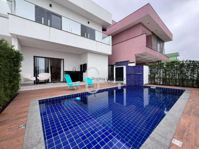 Casa com 4 dormitórios à venda, 207 m² por R$ 1.450.000,00 - Condomínio Flora Rica - Peruíbe/SP