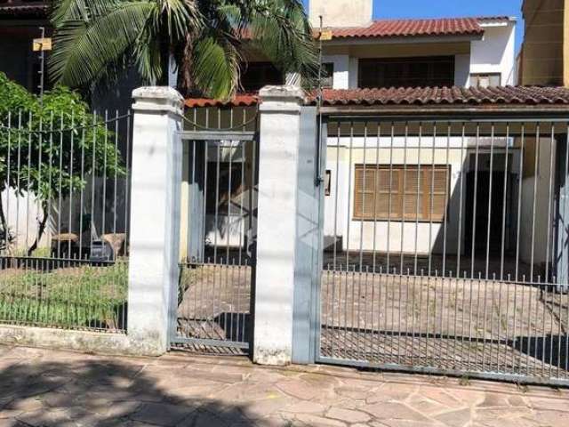 Casa com 5 quartos à venda na Rua Márcio Dias, 290, Nonoai, Porto Alegre por R$ 750.000