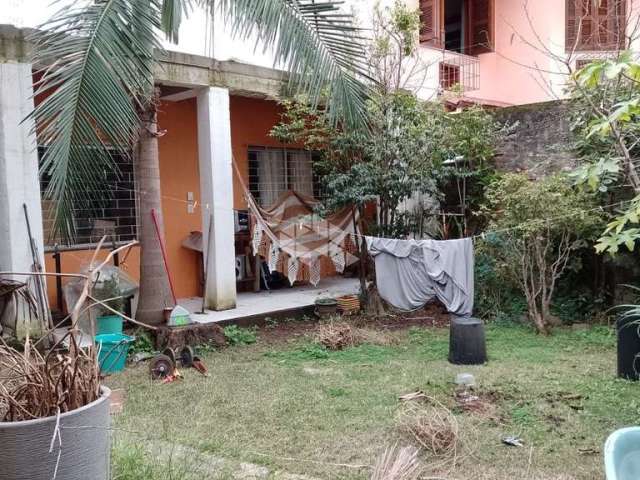 Casa com 2 quartos à venda na Rua Machado de Assis, 630, Partenon, Porto Alegre por R$ 670.000