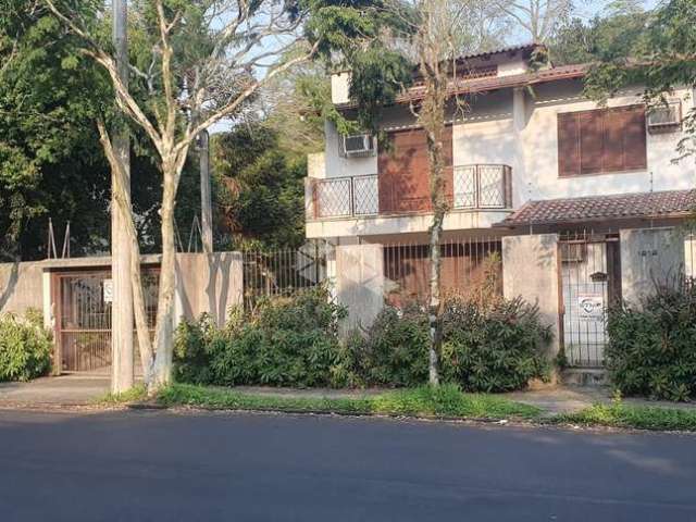 Casa com 4 quartos à venda na Avenida Fábio Araújo Santos, 1212, Nonoai, Porto Alegre por R$ 1.990.000