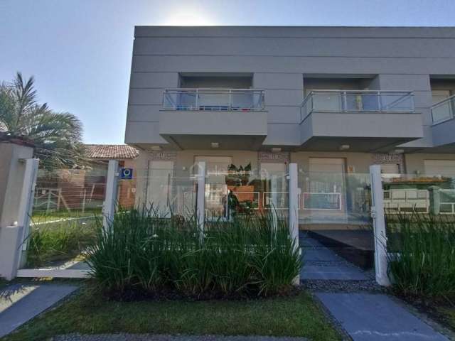 Casa em condomínio fechado com 2 quartos à venda na Rio Negro, 2431, Centro, Xangri-Lá por R$ 550.000