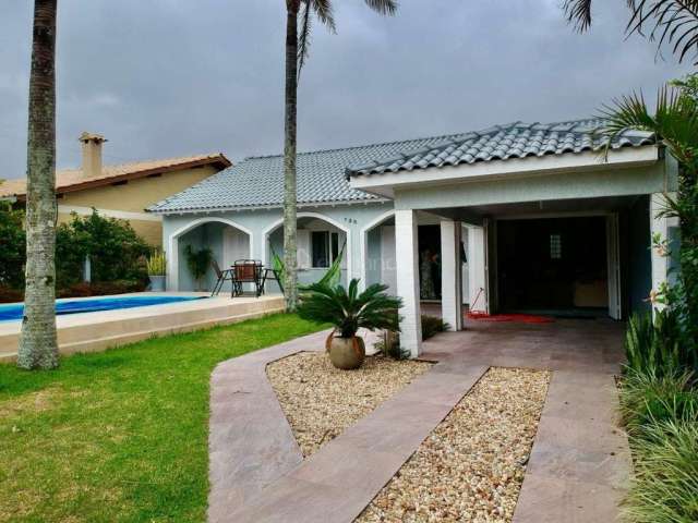 Casa em condomínio fechado com 3 quartos à venda na Das Dálias, 735, Noiva Do Mar, Xangri-Lá por R$ 690.000