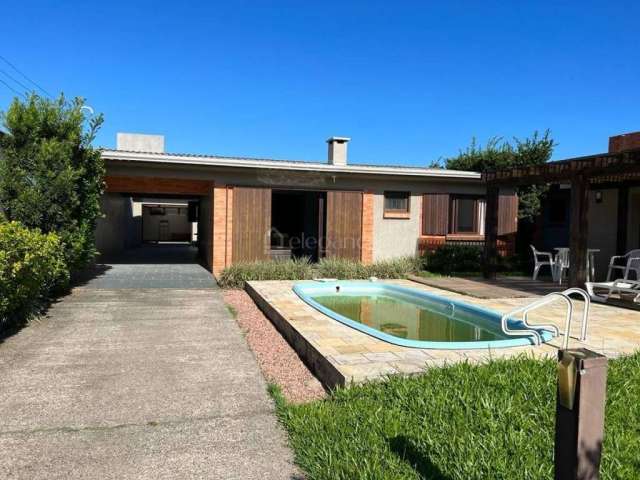 Casa em condomínio fechado com 2 quartos à venda na Rio da Várzea, 2252, Centro, Xangri-Lá por R$ 850.000