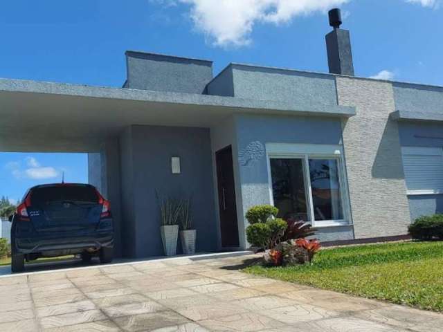 Casa em condomínio fechado com 2 quartos à venda na Heitor Villa Lobos, 200, Arpoador, Xangri-Lá por R$ 550.000