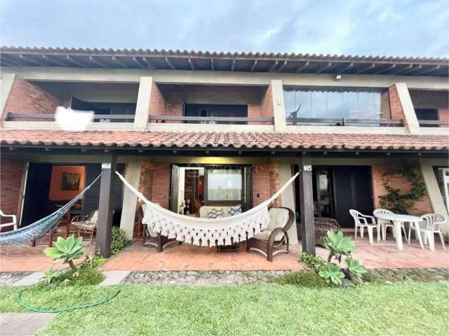 Casa em condomínio fechado com 2 quartos à venda na Beira Mar, 9, Centro, Xangri-Lá por R$ 620.000