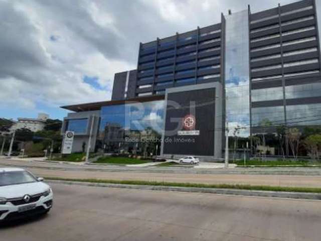 Sala comercial para locação no bairro Teresópolis, com aproximadamente 29,80m²  de área privativa, 01 banheiro. Portaria 24hs, elevadores, sala de reuniões, auditório, recepção e catracas. Localizado 