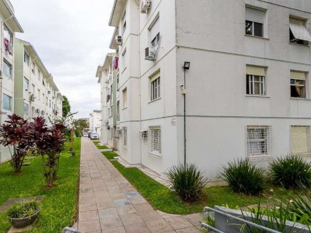 Apartamento de 2 dormitórios todo reformado, living, split, cozinha, banheiro com box, bancada e armário. Condomínio com playground, salão de festas, estacionamento rotativo.