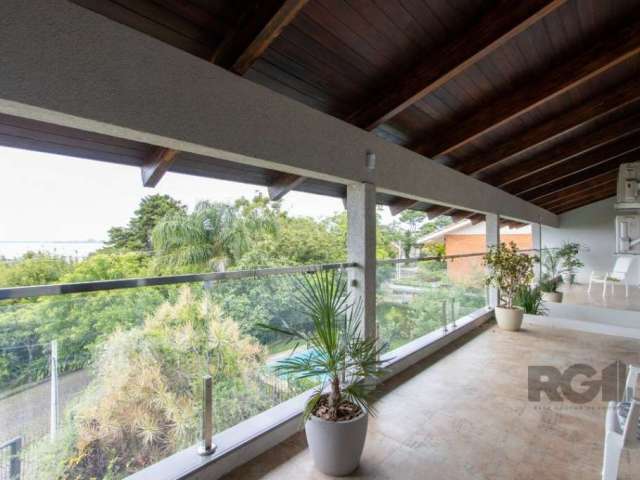 Impecável sobrado com bela vista para o Rio,  3 dormitóriosa, 2 suítes, sendo uma com closet e banheira de hidromassagem, living 3 ambientes com lareira,  gabinete, lavabo, sala de jantar, cozinha com