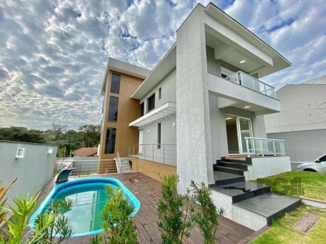 Casa Moderna com 4 Dormitórios no Bairro Guarujá&lt;BR&gt;&lt;BR&gt;Esta espaçosa casa no bairro Guarujá oferece um design moderno e funcional. Com 4 dormitórios, sendo 2 suítes, o imóvel proporciona 