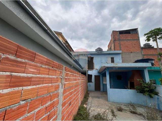 Terreno com casa nos fundos na vila itapoan -guarulhos