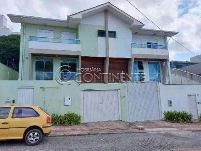 Casa com 3 dormitórios c/ 1 suíte em Coqueiros