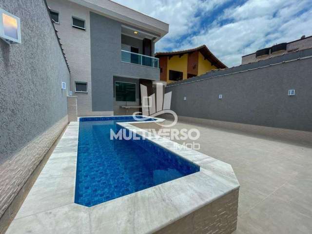 Sobrado com 3 dormitórios à venda, 135 m² por R$ 1.100.000,00 - Tupi - Praia Grande/SP