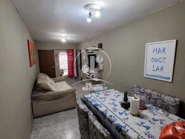 Casa à venda  com quatro dormitórios, dois banheiros, cozinha planejada, duas vagas de garagem.