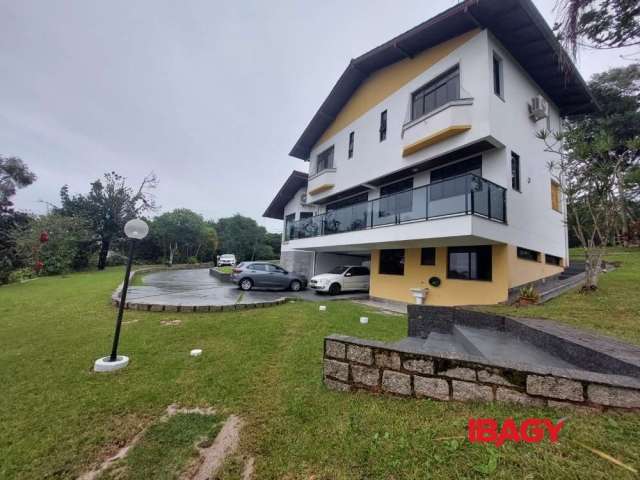 Casa em condomínio fechado com 4 quartos para alugar na Rodovia Haroldo Soares Glavan, 1900, Cacupé, Florianópolis, 400 m2 por R$ 14.500