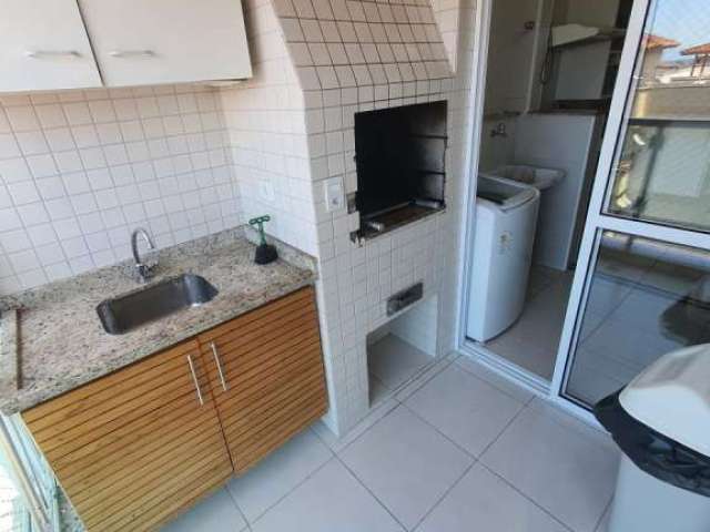 Apartamento com varanda gourmet e vista panorâmica na praia grande.