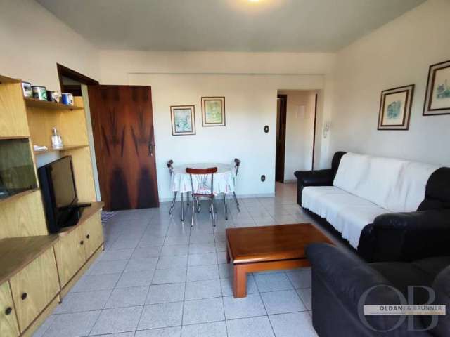 Apartamento com 2 dormitórios no centro.