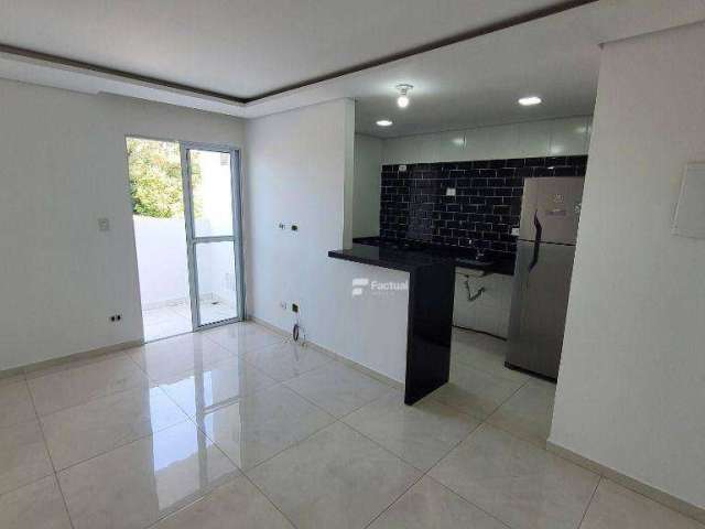 Apartamento com 2 dormitórios à venda, 59 m² por R$ 295.000,00 - Jardim dos Pássaros - Guarujá/SP