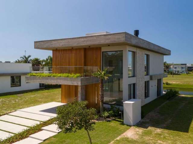 Casa em Condomínio 4 dormitórios à venda Guarita Torres/RS