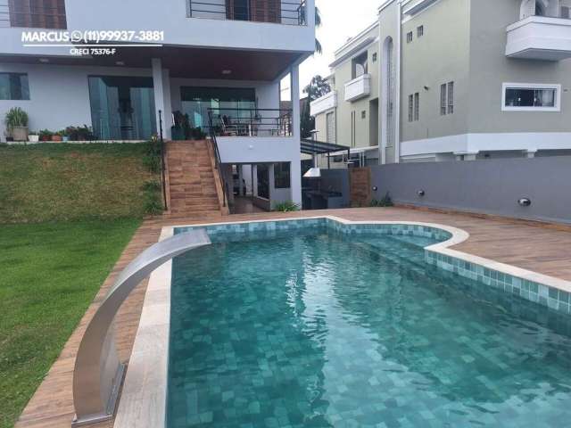 Linda casa no Parque dos Príncipes com 4 suítes, 5 vagas e piscina. FL23