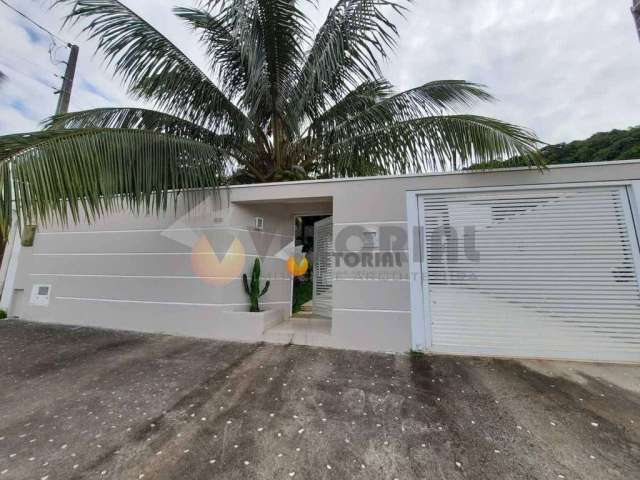 Casa com 4 dormitórios à venda, 236 m² por R$ 1.500.000,00 - Cigarras - São Sebastião/SP