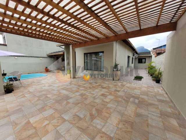 Casa com 3 dormitórios à venda, 230 m² por R$ 1.250.000,00 - Indaiá - Caraguatatuba/SP