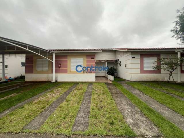 Casa em condomínio fechado com 3 quartos à venda na Avenida Paulo Roberto Vidal, 1, Bela Vista, Palhoça por R$ 340.000