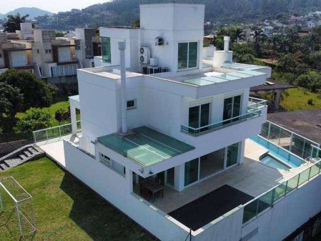 Terraço com vista mar, piscina e 5 suítes em Cacupé.