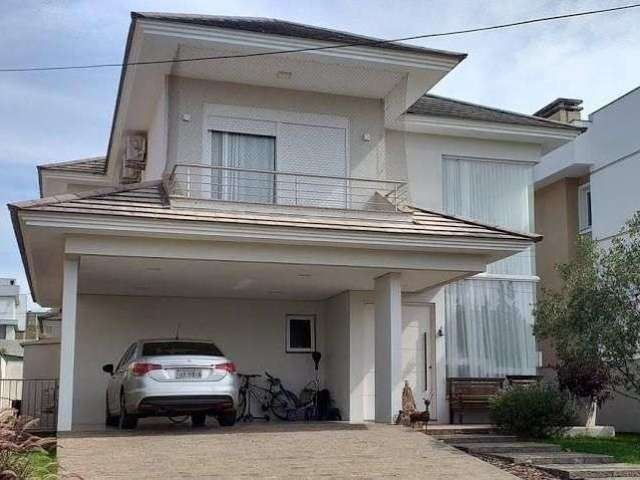 Casa com 4 dormitórios para alugar, 265 m² - Alphaville - Gravataí/RS